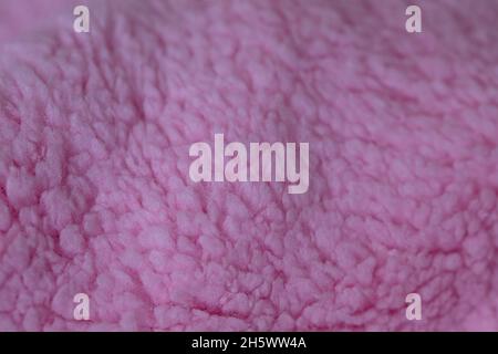 Rosa sherpa Plüsch Stoff strukturierten Hintergrund Stockfoto