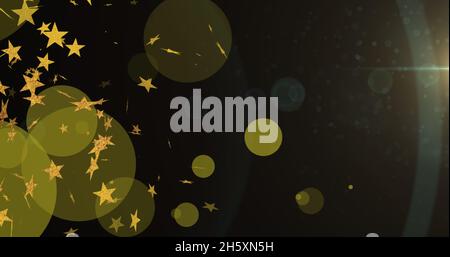 Bild von Lichtflecken und Sternen auf schwarzem Hintergrund Stockfoto