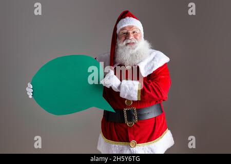 Weihnachtsmann mit leerem Textballon. Stockfoto