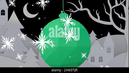 Bild von weihnachten Schneeflocken fallen über Kugel und Winterlandschaft auf schwarzem Hintergrund Stockfoto