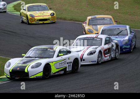 Lando Norris (GBR), der aktuelle Formel-1-Fahrer von McLaren, gewinnt seinen ersten Autorennen-Sieg während der Ginetta Junior Championship 2014 auf dem Croft Circuit, Stockfoto