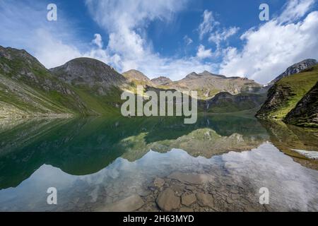 vals,mühlbach,provinz bozen,Südtirol,italien. Der wilde See mit der wilden kreuzspitze im Hintergrund Stockfoto