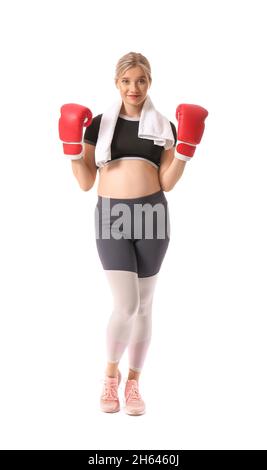 Junge Schwangerin Boxhandschuhen auf weißem Hintergrund Stockfoto