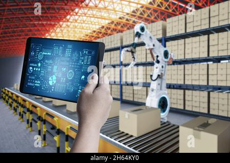 Techniker steuern 3d-Rendering-Automatisierungsroboter im Werk Stockfoto