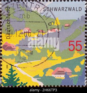 DEUTSCHLAND - UM 2006 : eine Briefmarke aus Deutschland, die ein verträumtes Tal im Schwarzwald zeigt Stockfoto