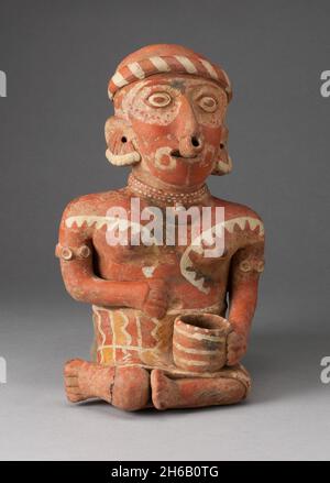 Sitzende weibliche Figur, die eine Schüssel auf ihrem Schoß hält, 100 B.C./A.D. 300. Stockfoto