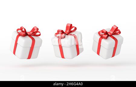 Drei weiße Geschenkboxen mit rotem Band auf weißem Hintergrund. 3d-Rendering Stockfoto