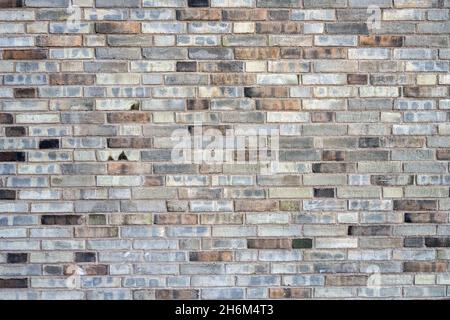 Hintergrund von einer grauen Ziegelwand Stockfoto