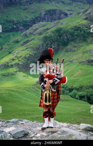 Highland Piper, Schottland Stockfoto