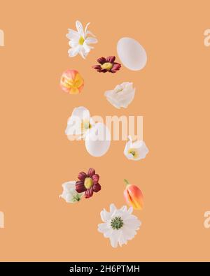 Weiße Gänseblümchen, Tulpen, Rosen, Ostereier und verschiedene Blumen schweben auf orangefarbenem Hintergrund. Minimalistisches und kreatives Frühlingskonzept. Stockfoto