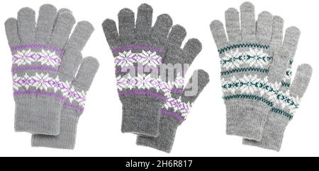 Set von warmen Wolle Winter Damen Strickhandschuhe im traditionellen Design mit nordischen geometrischen Ornament isoliert auf weißem Hintergrund Stockfoto