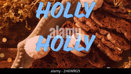 Bild von Stechstacheltext in Wiederholung über weihnachtsschmuck. weihnachten, Winter, Tradition und Feierkonzept digital generiertes Bild. Stockfoto