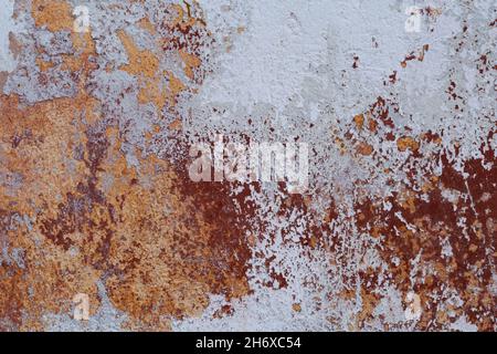 Abstrakte Farbmuster an der Wand eines alten Hauses. Stockfoto