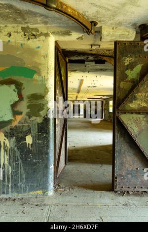 WA19784-00...WASHINGTON - Paint covered Graffiti at Battery Kinzie at Historic Fort worden, now part of Fort worden State Park. Stockfoto