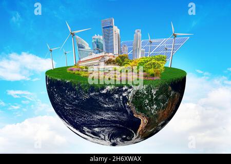 Planet Erde mit sauberer Natur Stadt auf erneuerbare Ressourcen angewiesen. Konzept einer nachhaltigen ökologischen Zukunft und alternative Energie einer umweltfreundlichen Stockfoto