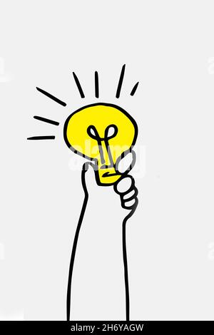 Eine Glühbirne in der Hand Stockfoto