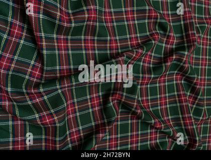 Grün Tartan Wolle Schule uniform Stoff Material. Klassischer schottischer nahtloser Flanellstoff. Traditionelles Wellenmuster für einen weihnachtlichen Hintergrund oder Stockfoto