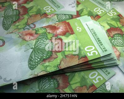 Geld aus Hongkong. Hongkong-Dollarscheine. HKDHSBC-Banknoten. 50 Dollar. Handel, Finanzen, Nachrichten Hintergrund. 3d-Illustration. Stockfoto