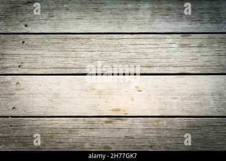 Holzbretter horizontal mit viel Textur und hellen Tönen platziert. Hintergrundkonzept. Stockfoto