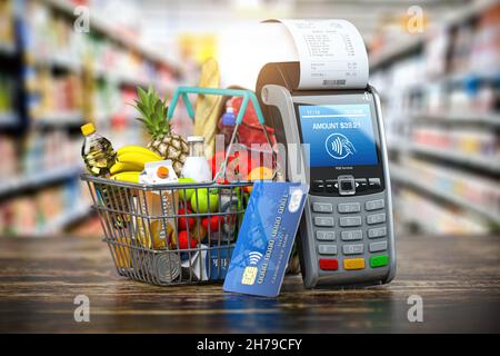 Buing Essen und Trinken online. Einkaufskorb mit Lebensmittel- und POS-Terminal und Cedit-Karte im Lebensmittelgeschäft. 3D Abbildung Stockfoto