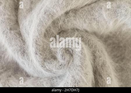 Strudel aus grauem Alpaka-Stoff und Pullover aus Mohair-Wolle Stockfoto