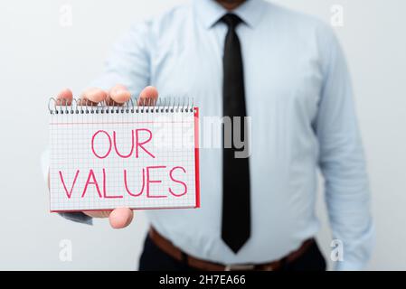 Textunterschrift mit unseren Werten. Überblick über das Unternehmen Dinge, die Sie für wichtig halten, wie Sie leben und arbeiten, um neue Pläne und Ideen zu präsentieren Stockfoto