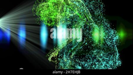 Bild von grünen und blauen Partikeln im weißen Lichtstrahl und blauen Lichtern auf schwarzem Hintergrund Stockfoto