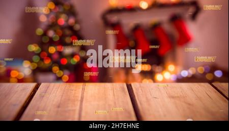 Bild eines Stechstacheltextes in Wiederholung über dem weihnachtsbaum Stockfoto