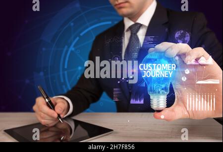 Geschäftsmann mit Glühbirne, neues Geschäftskonzept Stockfoto