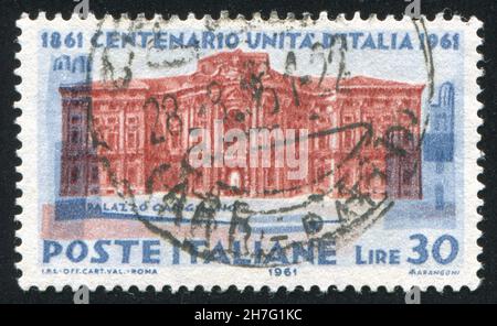 ITALIEN - UM 1961: Briefmarke gedruckt von Italien, zeigt den Palast von Carignano, um 1961 Stockfoto