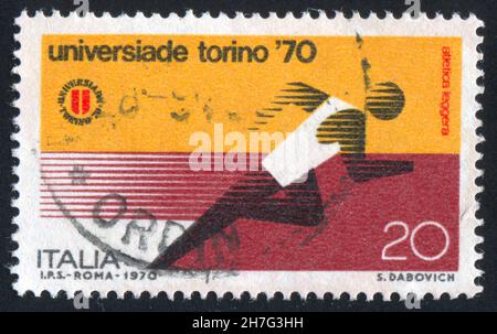 ITALIEN - UM 1970: Briefmarke gedruckt von Italien, zeigt Runner, um 1970 Stockfoto