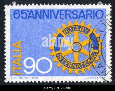 ITALIEN - UM 1970: Stempel gedruckt von Italien, zeigt Rotary Emblem, um 1970 Stockfoto