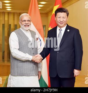 XI JINPING Generalsekretär der Kommunistischen Partei Chinas mit dem indischen Premierminister Narendra Modi im April 2018 in Wuhan. Stockfoto