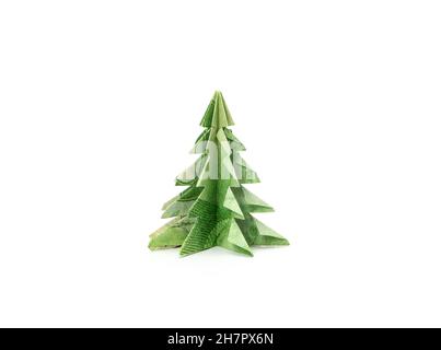 Origami Weihnachtsbaum aus Papiergeld. Grüner Miniatur-Weihnachtsbaum gefaltet mit gefälschter kanadischer Währung. Konzept für Baumknappheit, finanzielle Belastung Stockfoto