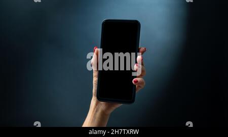 Hand halten smartphone Stockfoto