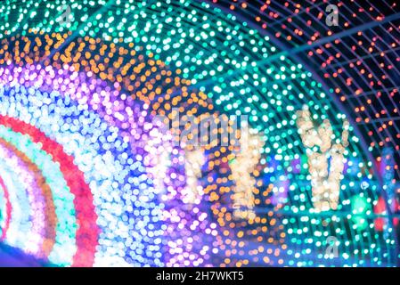 Bunte Bokeh Glitter defokussierte Lichter abstrakten Hintergrund. Stockfoto