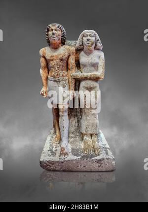 Alte gyptische Statue von Kai-pu-ptah und Ipep, 2400 v. Chr., 5th Dynastie, Gizeh Nekropole. Kunsthistorisches Museum Wien Inv. AS 7444. Kalksteinhöhe Stockfoto