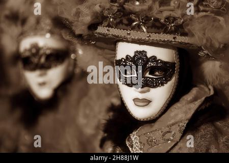 Karneval in Venedig, Carnevale di Venezia, Masken in Venedig, Maskerade Venice, Venedig Maske oder Masken mit Kostümen, Kleider und schönen Frauen Stockfoto