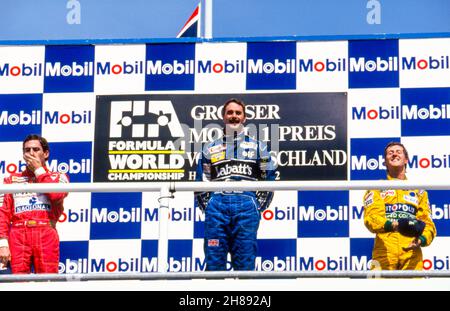 01 Senna Ayrton (BRA), Honda Marlboro McLaren, McLaren-Honda MP4/7A, 05 Mansell Nigel (gbr), Canon Williams Team, Williams Renault FW14B, 19 Schumacher Michael (ger), Camel Benetton Ford, Benetton-Ford B192 auf dem Podium beim Großen Preis von Deutschland 1992 auf dem Hockenheimring, 10th Lauf der FIA Formel 1 Meisterschaft 1992 vom 24. Bis 26. Juli 1992 in Hockenheim, Deutschland - Foto Gilles Levent / DPPI Stockfoto