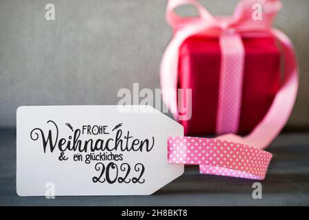 Rosa Weihnachtsgeschenk, Kalligraphie Glueckliches 2022 Bedeutet Glücklich 2022 Stockfoto