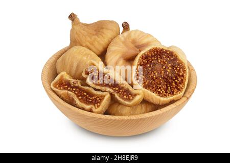 Getrocknete Feige in Holzschüssel isoliert auf weißem Hintergrund mit Beschneidungspfad und volle Schärfentiefe Stockfoto