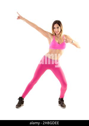 Zumba Dance Fitness-Trainer macht Sport Aerobic-Übungen. Motivierender Coach. Indoor-Training Stockfoto