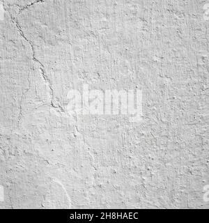 Weiß getünchte verputzte Wand, strukturierter Hintergrund. Stockfoto
