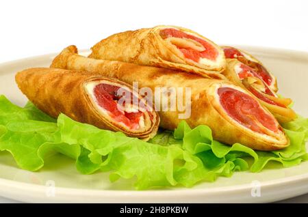 Drei Tortillas auf einem Salatblatt Stockfoto