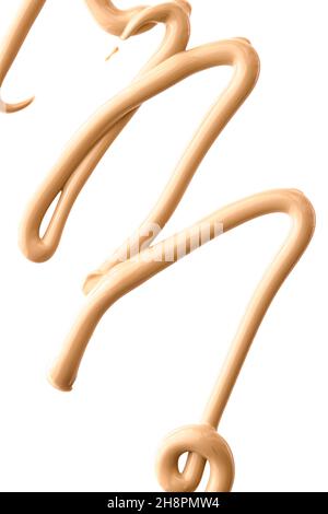Beige kosmetische Textur isoliert auf weißem Hintergrund, verschmiert Make-up Emulsion Creme Abstrich oder Foundation Abstrich, zerkleinert Kosmetik-Produkt und Stockfoto