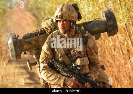 Britische Kommandos der Royal Marine während der Operation Sond Chara, die den Bezirk nad-e Ali, Provinz Helmand der Aufständischen, am 29. Dezember 2008 in Lashkar Gah, Afghanistan, räumte. Stockfoto