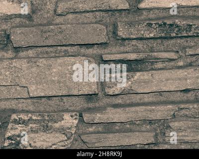 Rustikaler und gealterter Wandstein, Außenwand Stockfoto