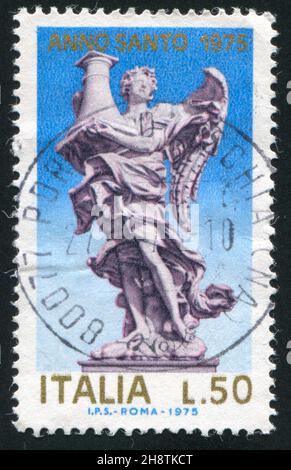 ITALIEN - UM 1975: Stempel gedruckt von Italien, zeigt Angel mit Säule, um 1975 Stockfoto