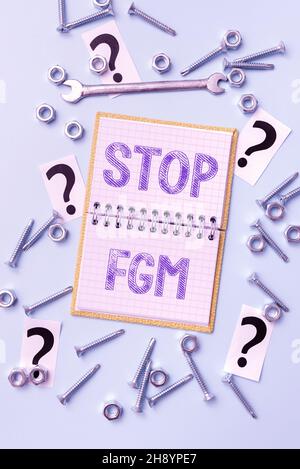 Schreiben mit Text Stopp FGM. Geschäftskonzept Schluss mit Genitalschnitt und Beschneidung Neue Ideen Brainstoming für die Wartungsplanung Stockfoto