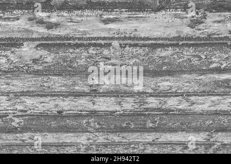 Altes Roofing Filz Material auf dem Dach Abdeckung Bitumen Oberfläche Textur Hintergrund. Stockfoto